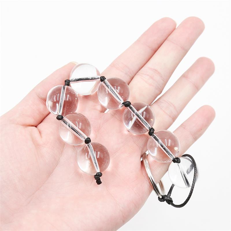 Late To Bed Glass Anal Beads in hand