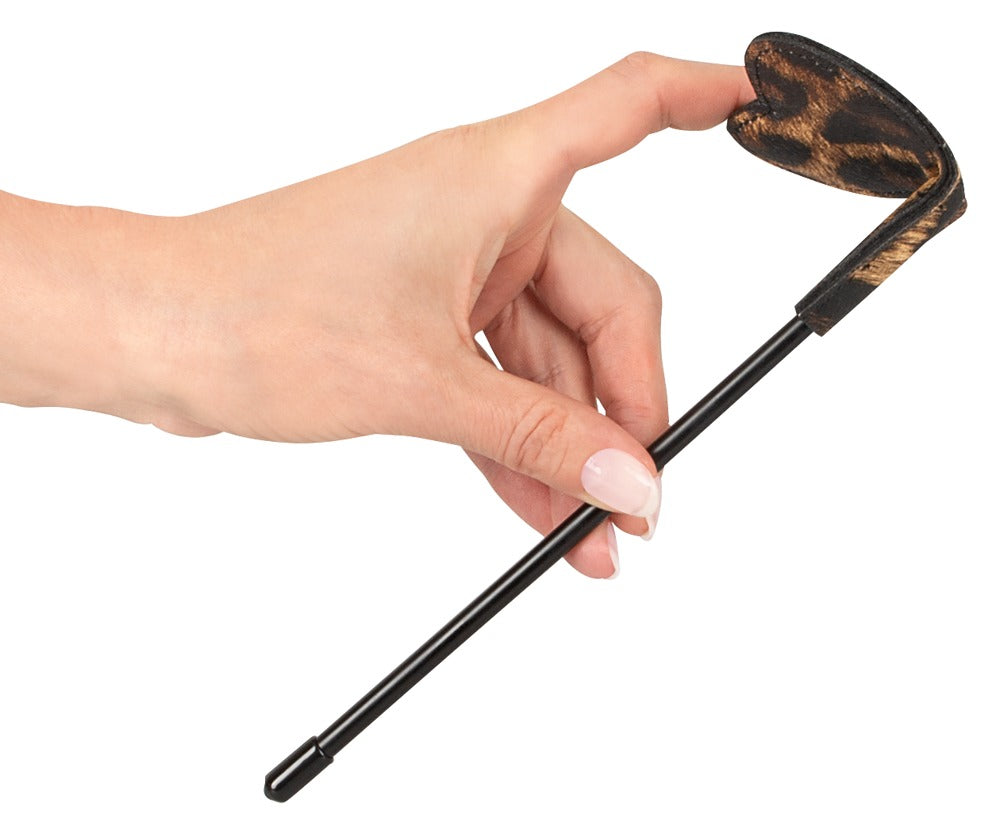 Excellent Power Heart Shaped Leopard Print Paddle in hand