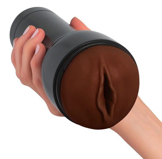 Kiiroo Feel Dark Brown Masturbator in hand