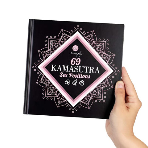 SecretPlay Kama Sutra Sex Positions Book in hand